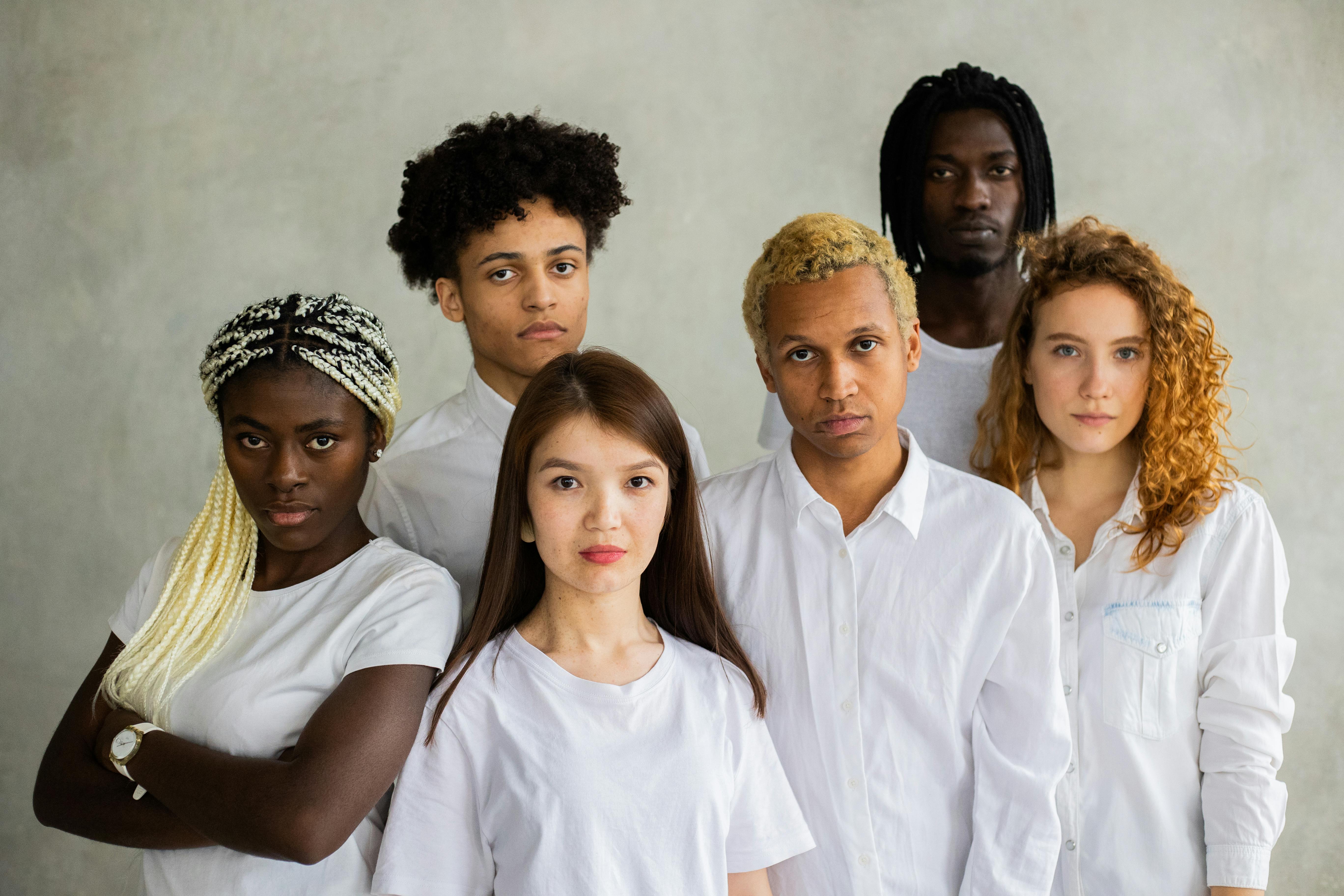 Diverse group of young adults standing together